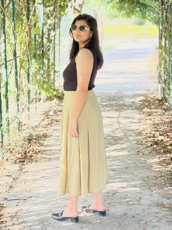 Green pleatique skirt