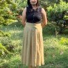 Green pleatique skirt
